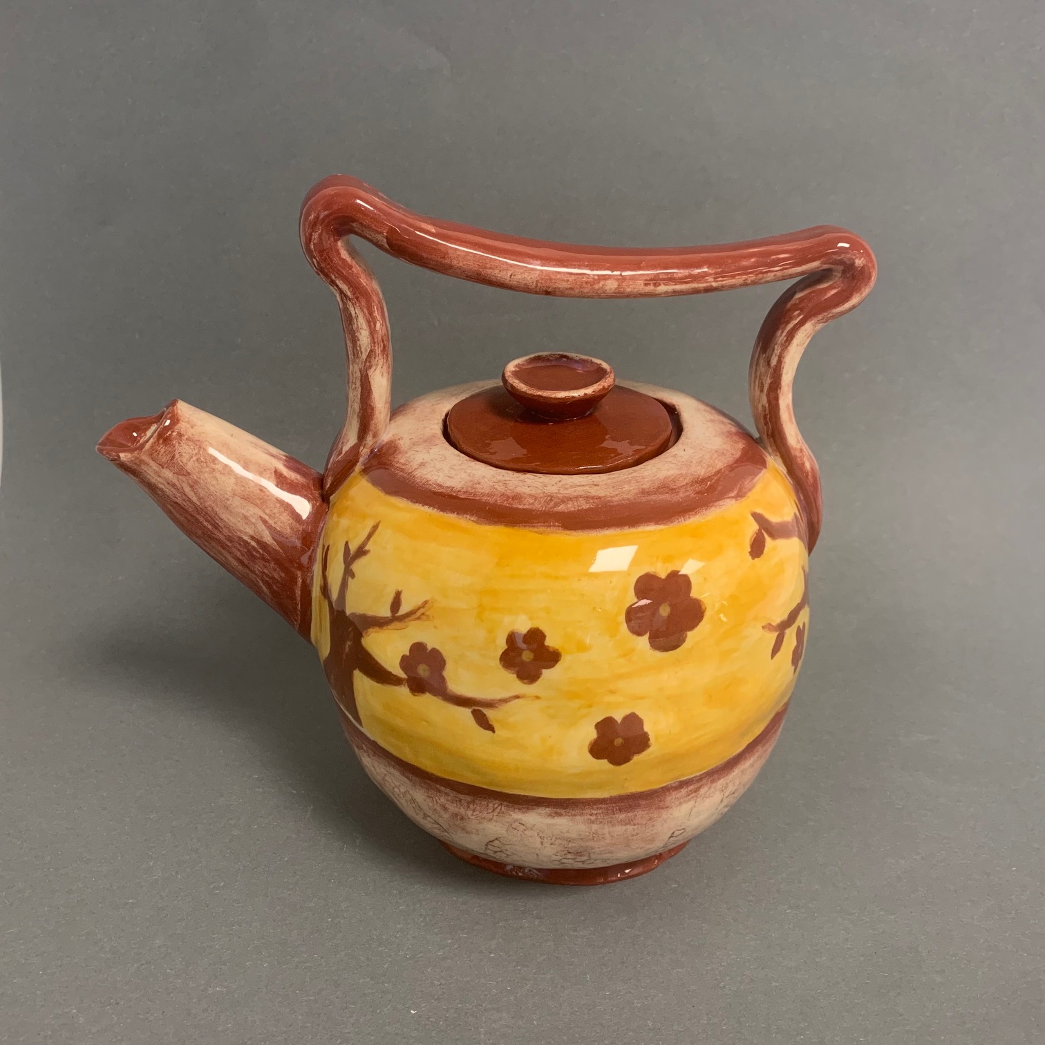 en tekanne med et håndtak